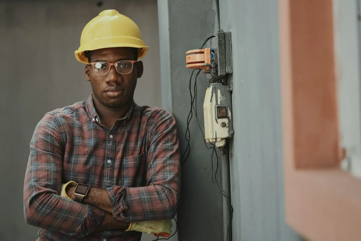 Technician servicing an air conditioning unit